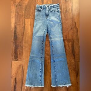 Good American Woman’s Flared Jeans size 0/25